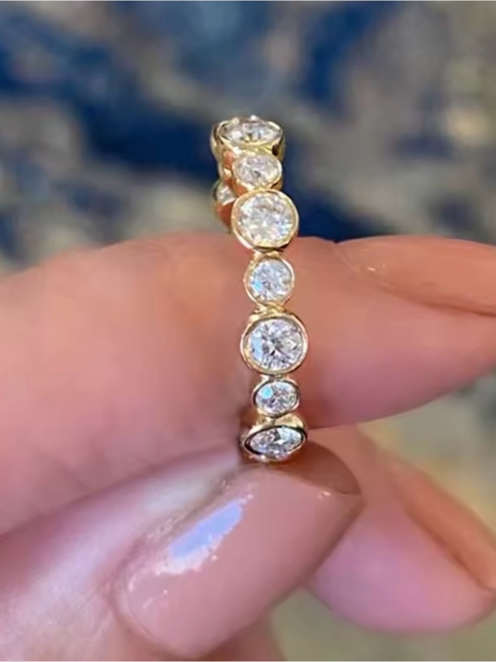 Gold Bezel-Set Eternity Ring with Clear Stones